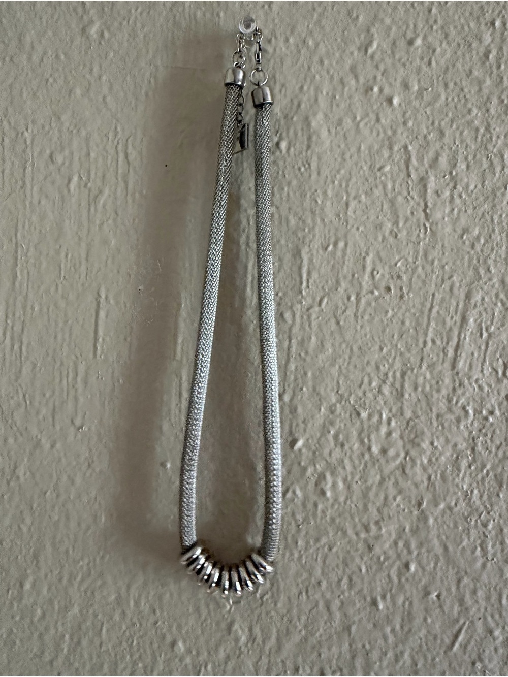 Anne Klein Rolled Silver-tone Rope Necklace with Ring Accent